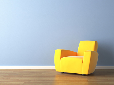 interior design yellow armchair on blue wall